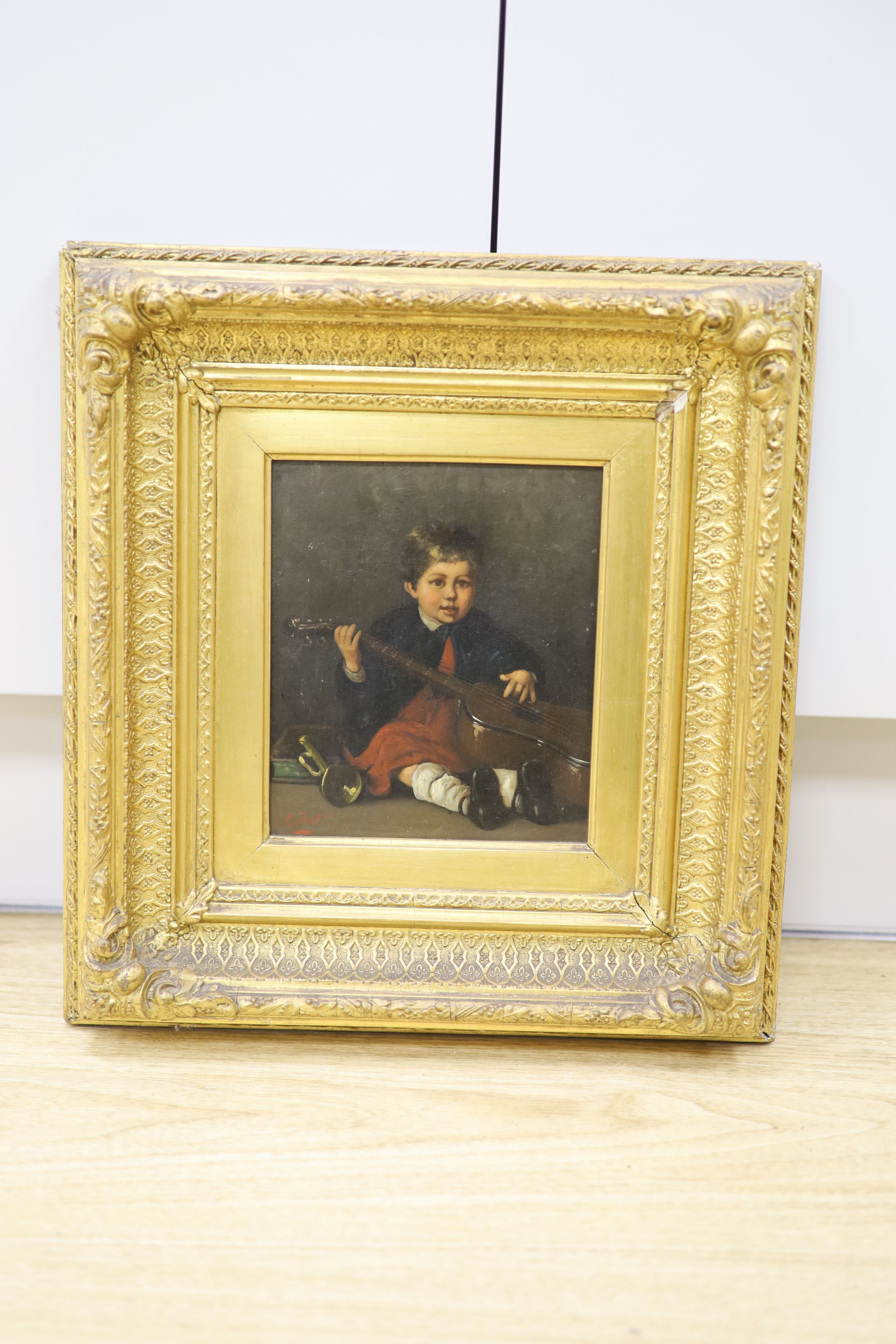 A. Gilbert (19th C.), oil on canvas, Portrait of a boy holding a guitar, signed, 20 x 17cm